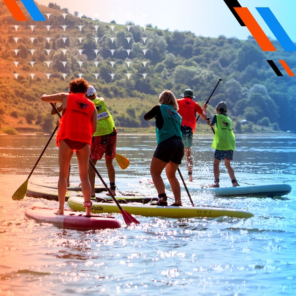 Stand-up paddlers on the lake – Paddle board competition, Transylvania Triathlon Festival